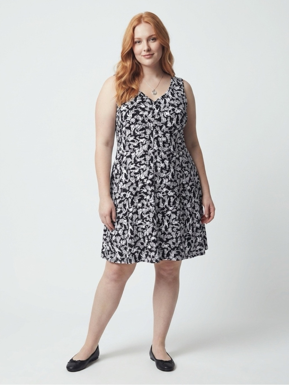 Disney Black & White Floral V-Neck Mini Dress with 101 Dalmatians on the dress